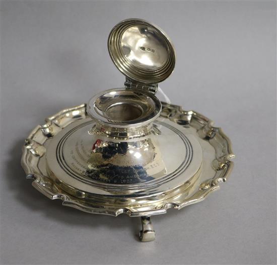 A George V silver waiter and a George V silver capstan inkwell.